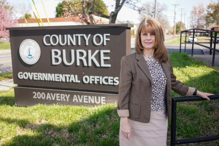Kay Draughn, clerk to the Burke County Board of Commissioners, stands outside the county offices in downtown Morganton.