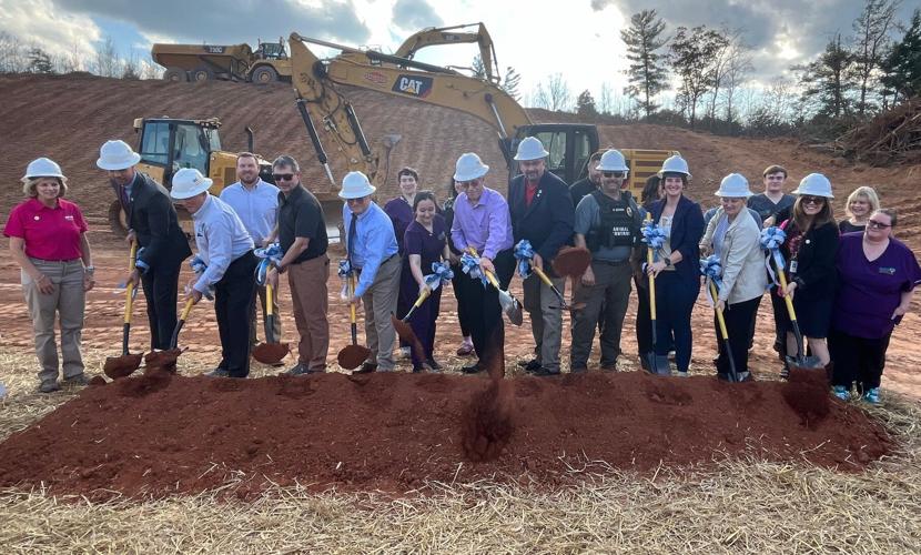 Animal Services personnel and county officials break ground for Burke's new Animal Services building Friday.