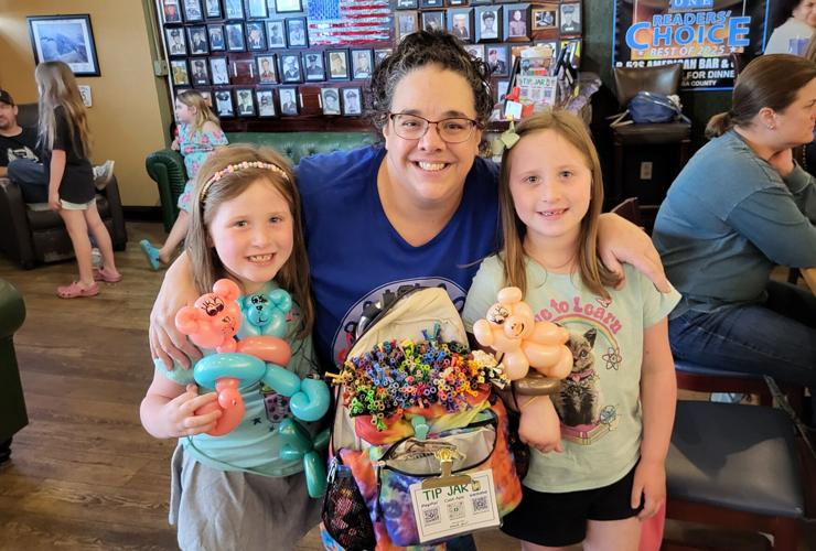 Becki the Balloon Lady with regulars, Ruby and Reagan Swanson