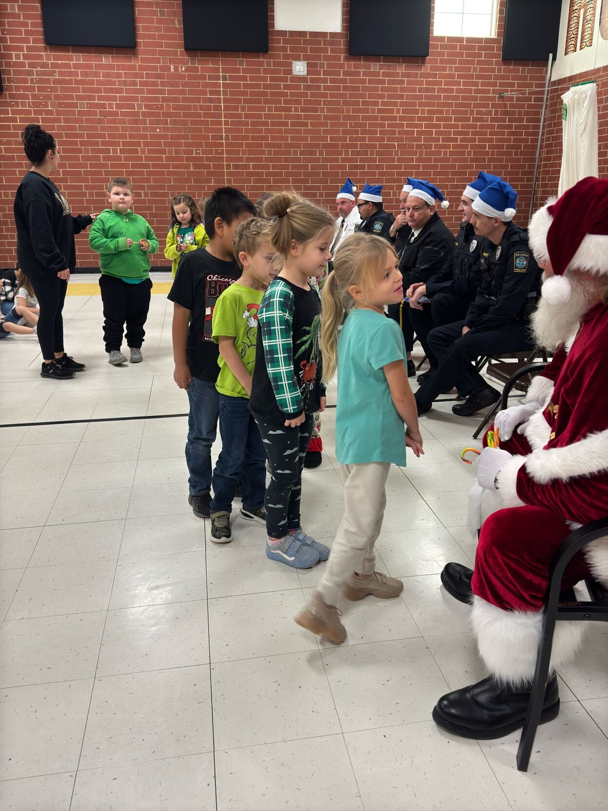 Valdese PD and Santa with Elementary kids