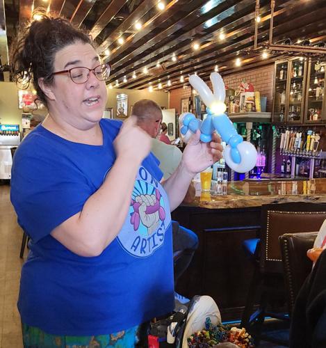 Becki the Balloon Lady makes a motorcycle balloon