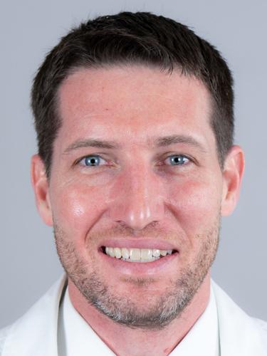 Dr. Adam J. Kinninger