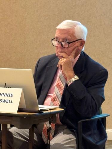 Opioid Committee member Johnnie Carswell listens to a presentation during the group's first meeting Tuesday. The former county commissioner is a longtime advocate for addiction treatment on the state and local level.