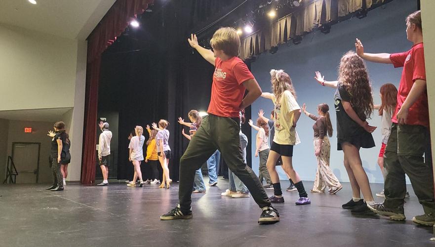 Cast members practice a dance number for 'Descendants the Musical'