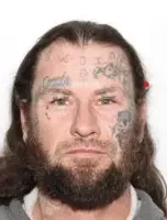 Suspect at large in Morganton following escape on foot