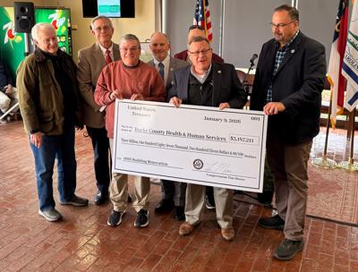 Congressman Tim Moore presents check