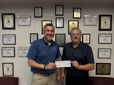The Paris News donates $10K to Children’s Advocacy Center of Paris via Walls Foundation