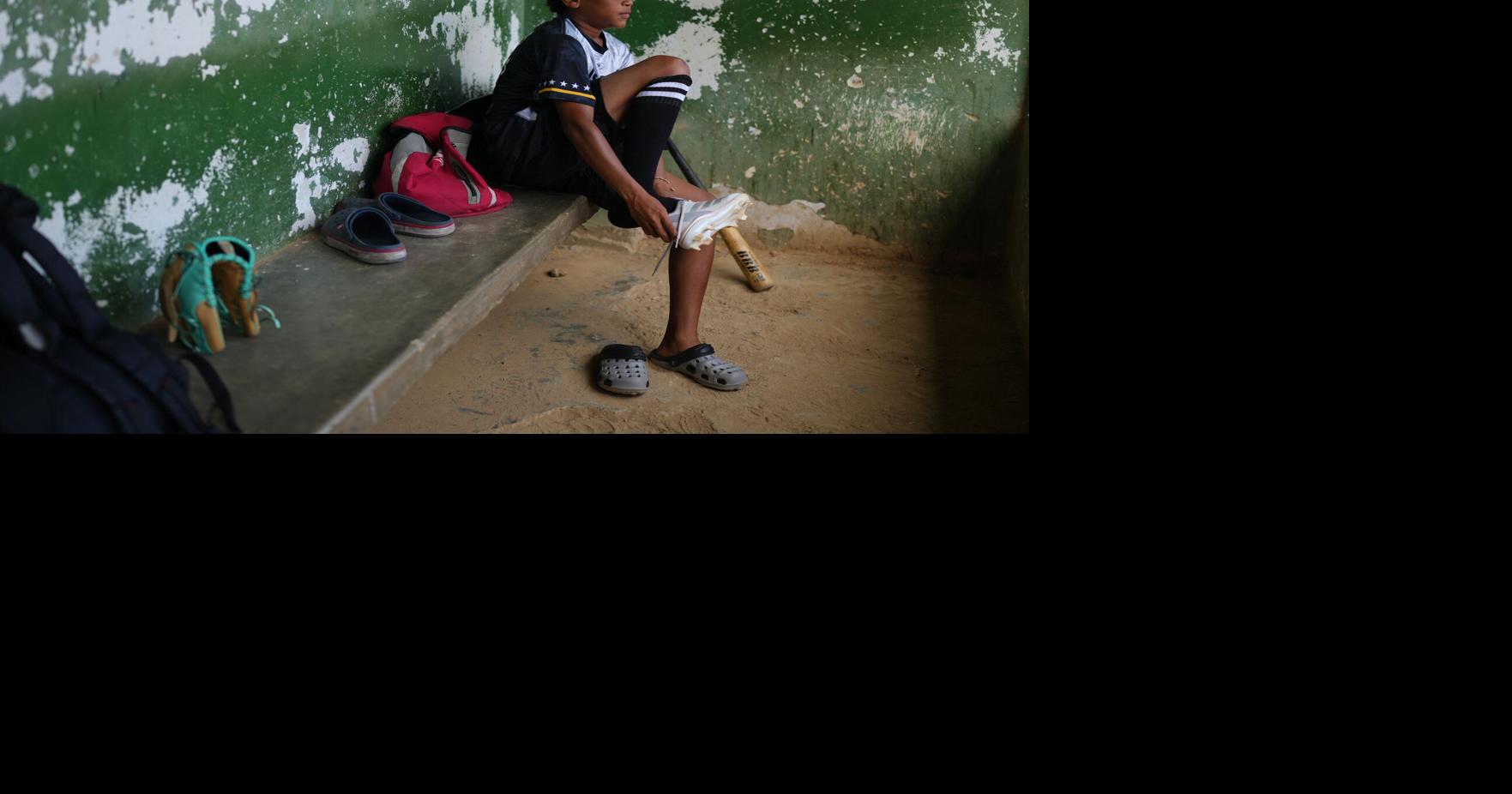 A 12-year-old baseball standout trains through tears after Venezuela quakes leave him homeless