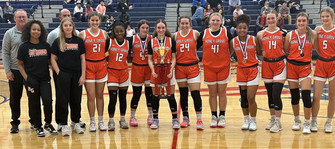 Lady Warriors push way to tourney title Sports