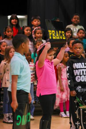 Justiss first-grade students honor Dr. Martin Luther King Jr. through music and message