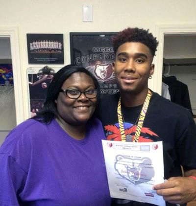 Wallace Signs To Play Basketball At Barclay Sports