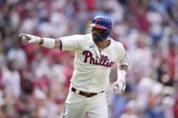 Harper, Turner homer to help lift Phillies over Royals