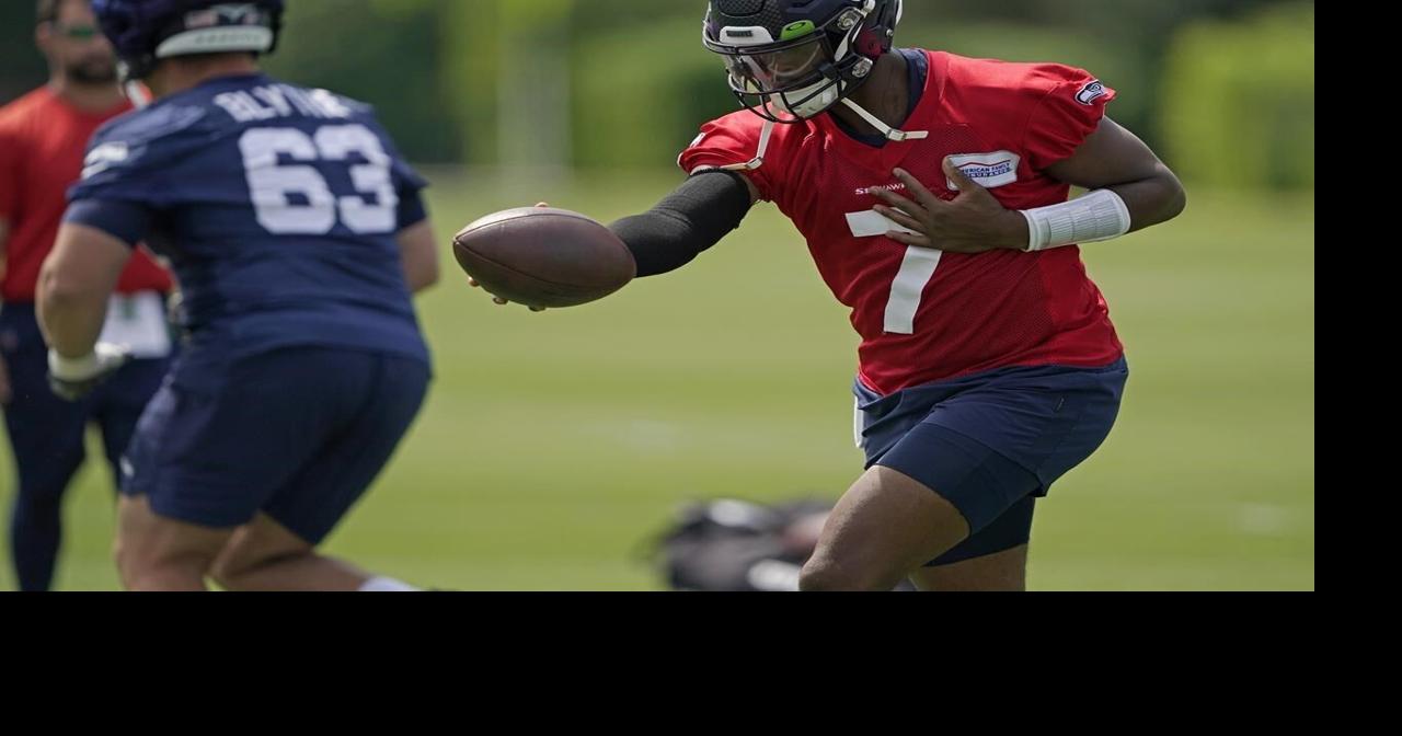 Seahawks QBs Lock, Smith hope for edge in preseason opener