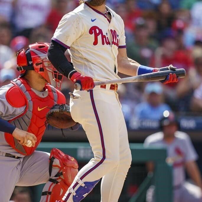 Nola, Schwarber lead Phillies to a 3-game sweep of Cardinals with