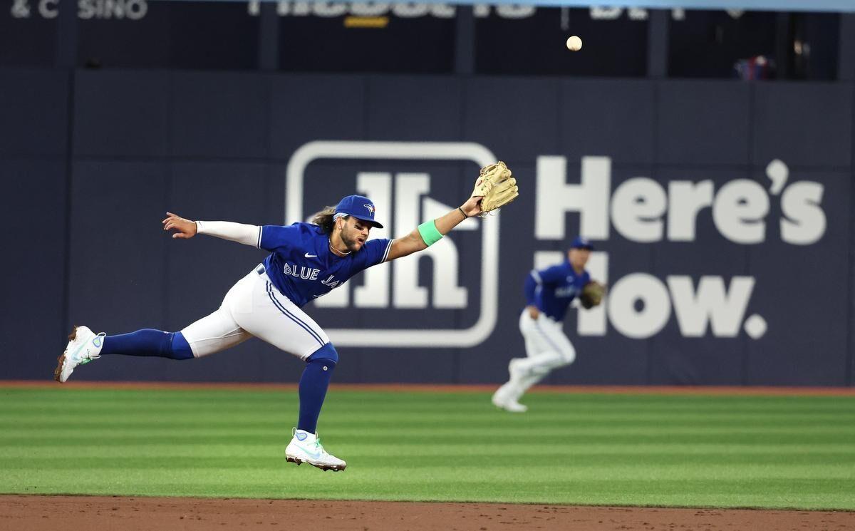 Whit Merrifield and Alek Manoah lead the Blue Jays to a 12-2 victory over  the Tigers 