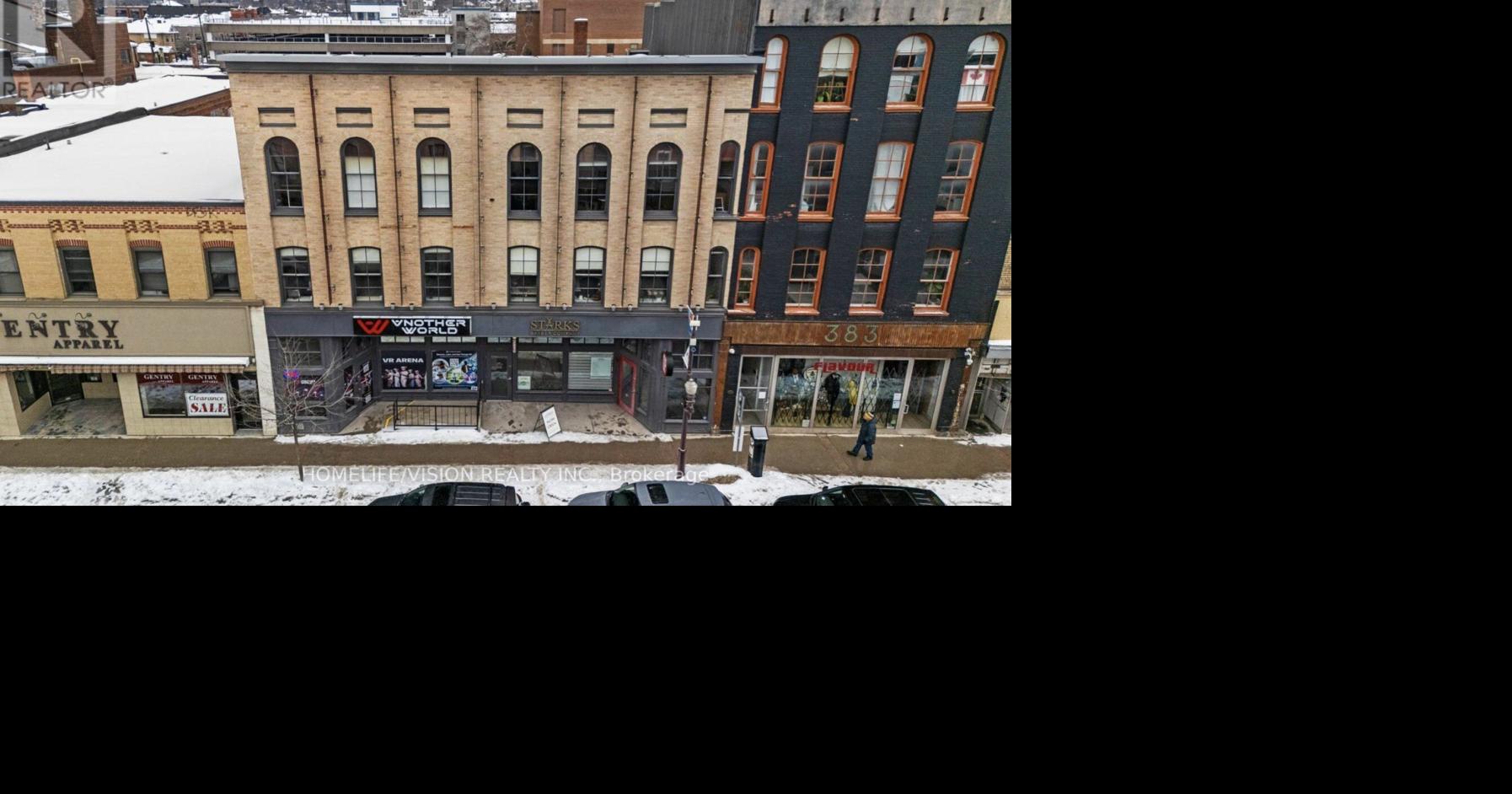 Historic downtown Peterborough building listed for $3.7M includes barbershop, VR arena, ad agency as tenants