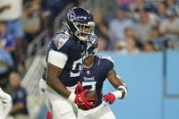 Tennessee Titans running back Julius Chestnut fumbles as he is hit by New  England Patriots defensive end Jeremiah Pharms Jr. in the first half of an  NFL preseason football game Friday, Aug.