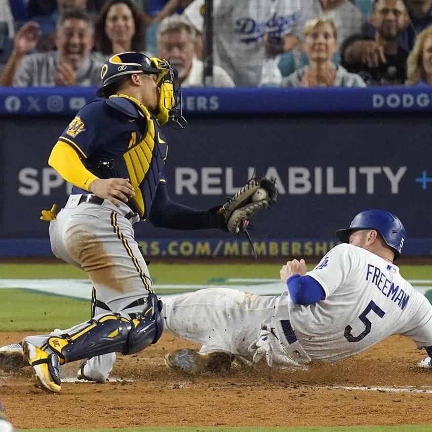 Two catcher's interference calls help Dodgers beat Brewers 7-1 for