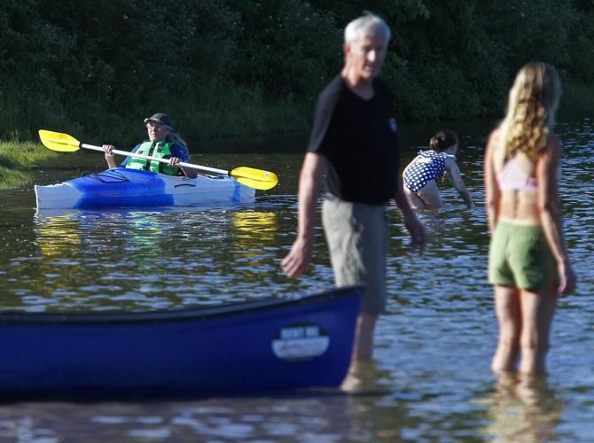 Photos People take to waters in canoes, kayaks for Family Paddle Day