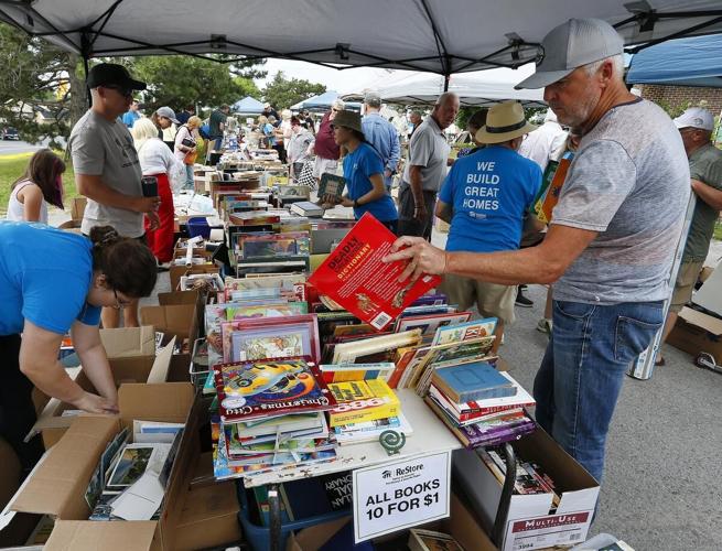 Photos Hundreds flock to yard sale at Habitat for Humanity ReStore in