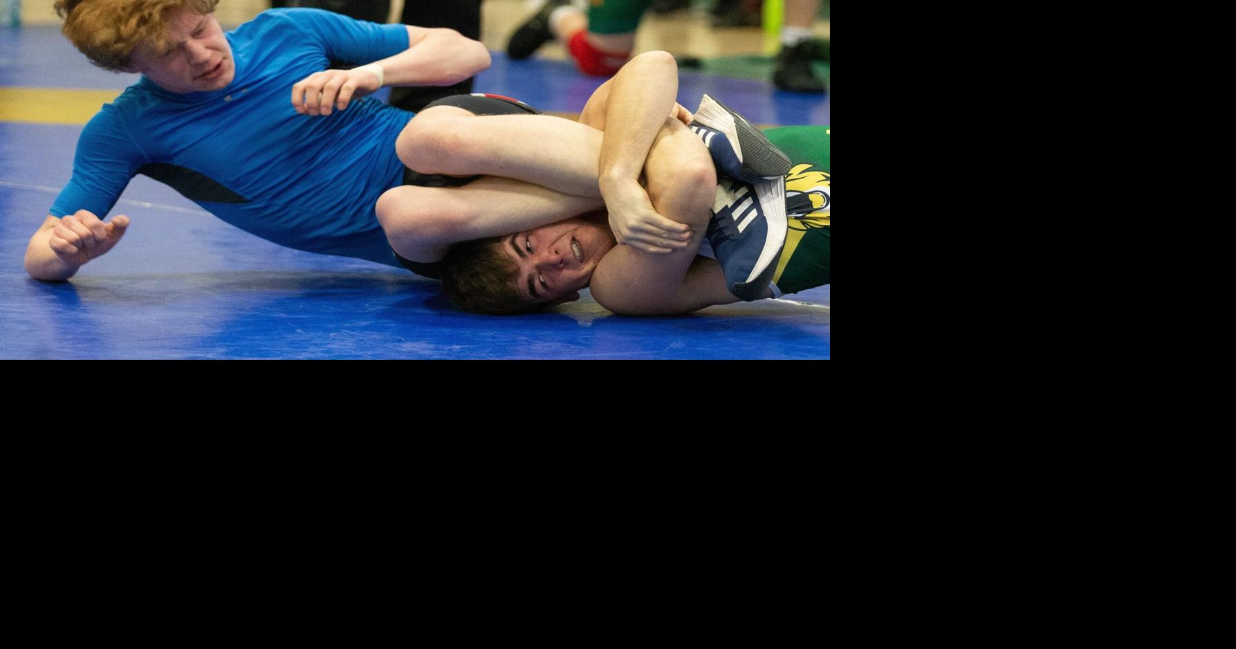 Pinning the competition at wrestling tournament