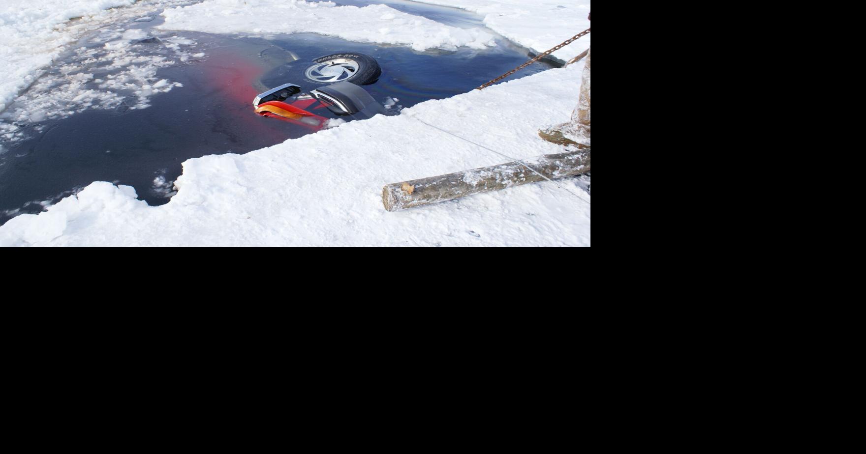 Two men rescued after truck breaks through ice UPDATE(00)