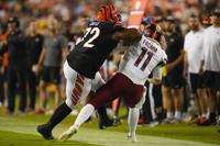 Landover, MD, USA - August 21, 2023 : Washington Commanders quarterback  Jake Fromm (11) throws the p