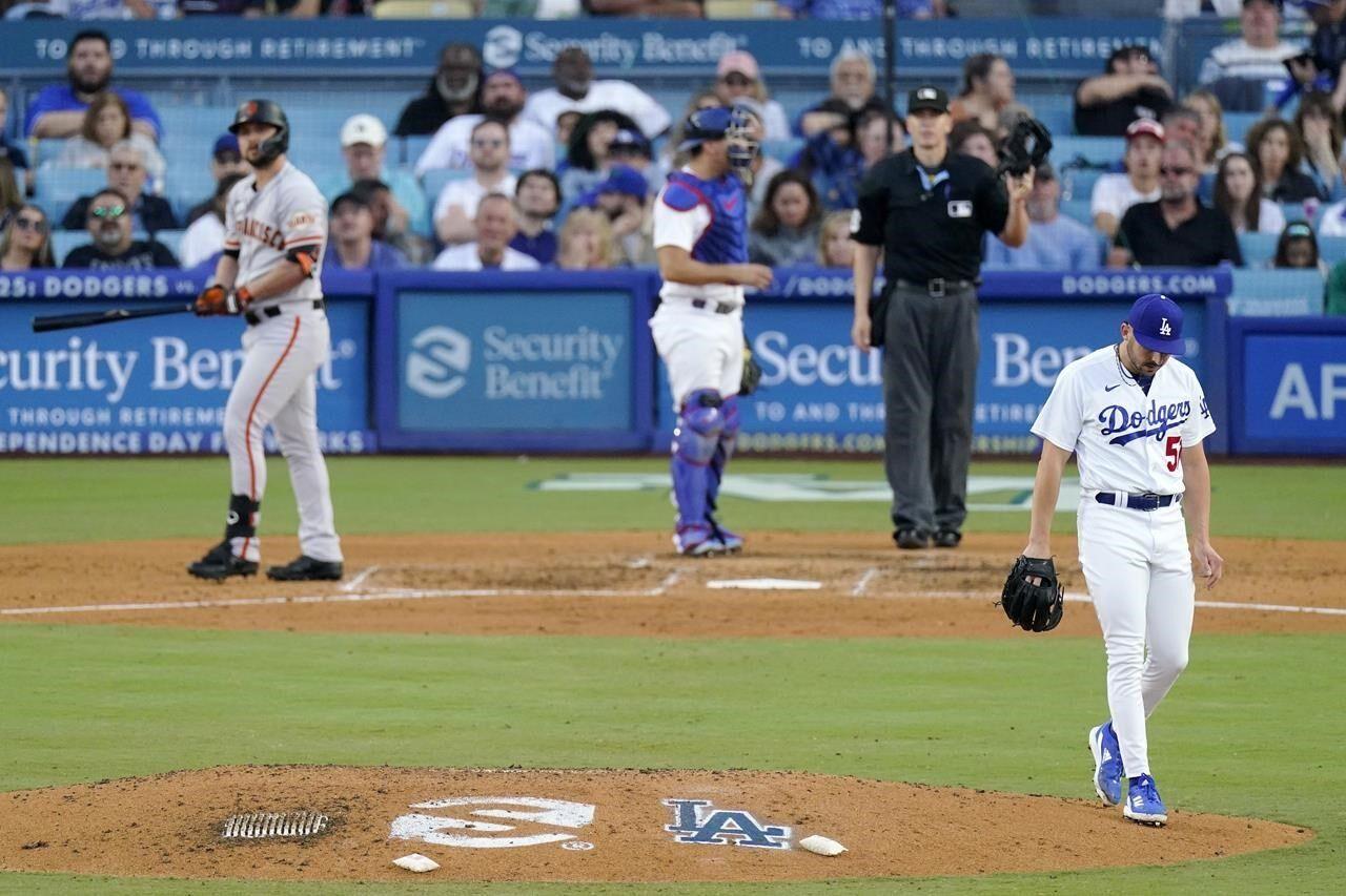 Betts' grand slam caps 8-run 4th inning as the Dodgers stun the