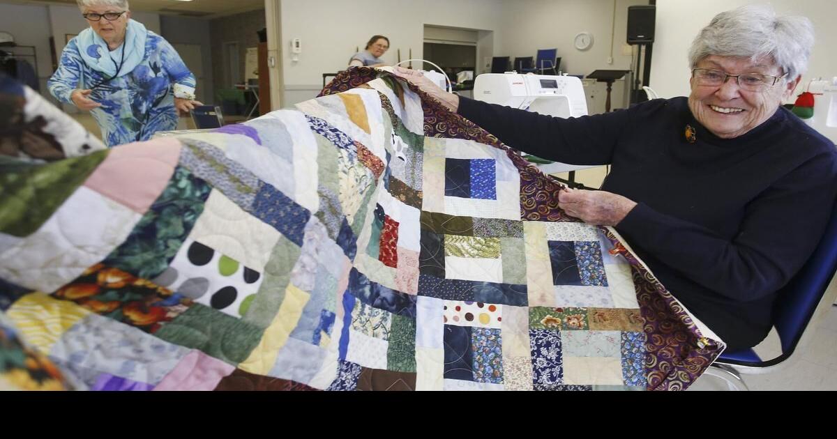 Northcrest Ward Peterborough quilters holding QuiltIn at Trent