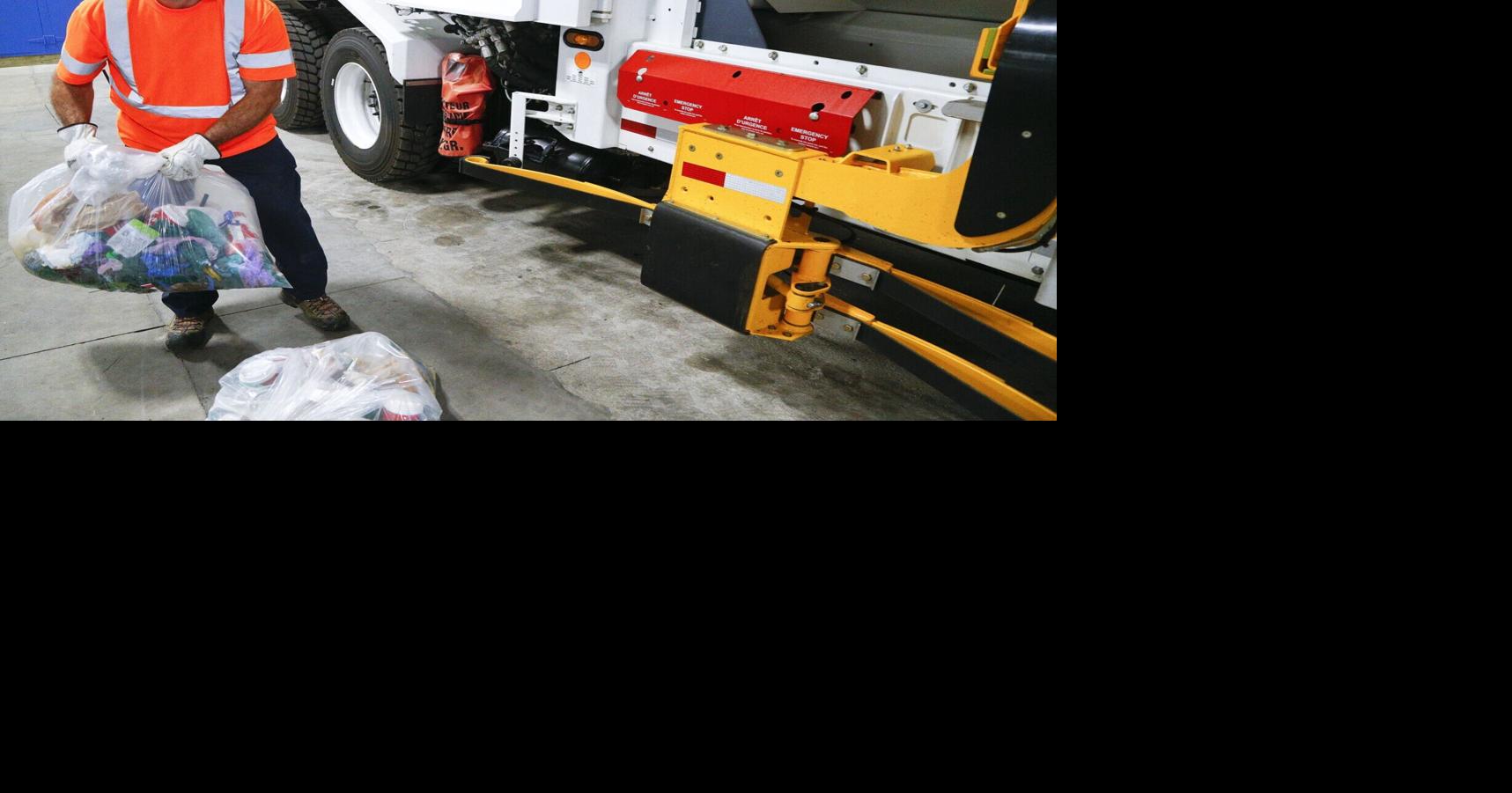 City to continue garbage pickup to condos for now