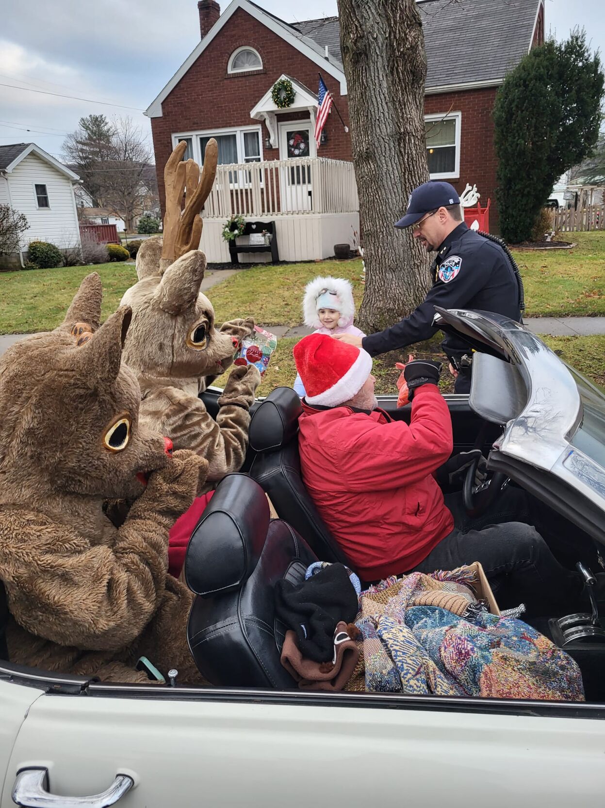 Rudolph Rudy Rude Local couple helps Rudolph and Little Rudy spread Christmas cheer ...
