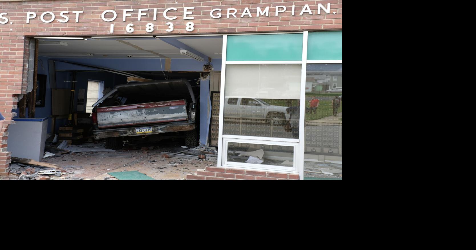 TRUCK BARRELS THROUGH GRAMPIAN POST OFFICE Local