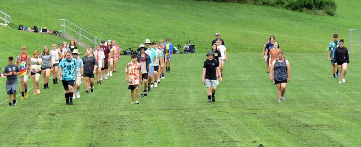 Curwensville's Golden Tide marching band fans to "The Jungle