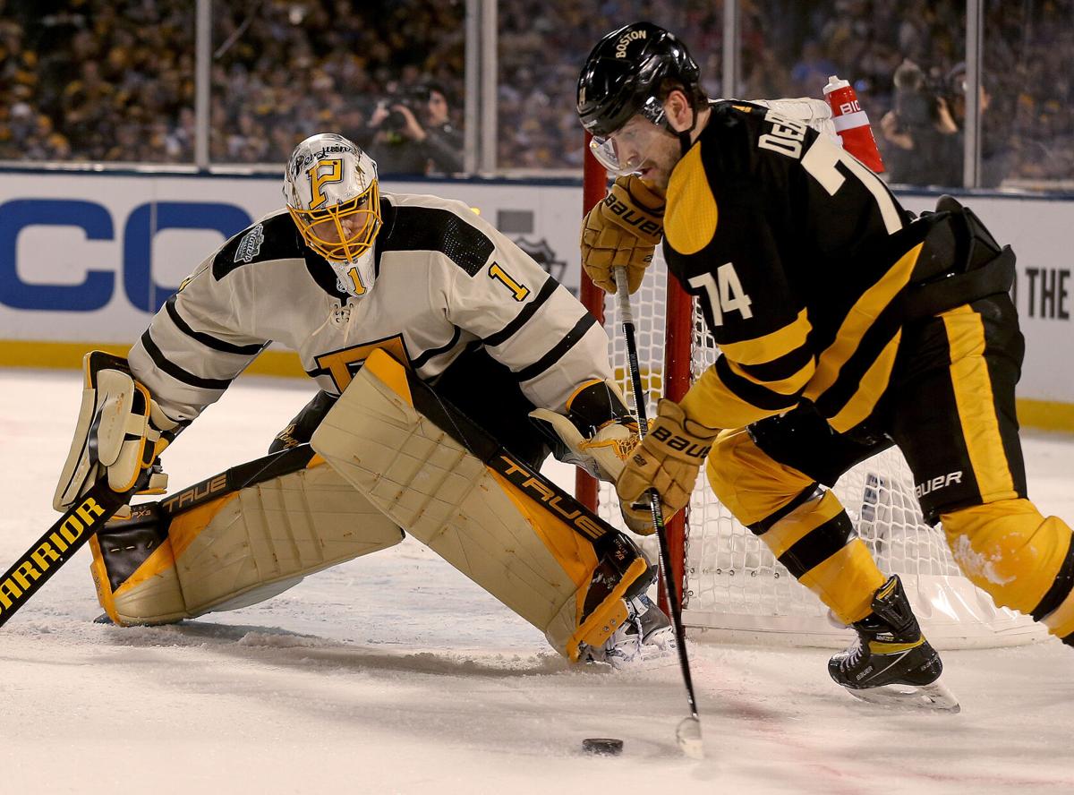 Jake DeBrusk scores twice as Bruins edge Penguins at Winter Classic 