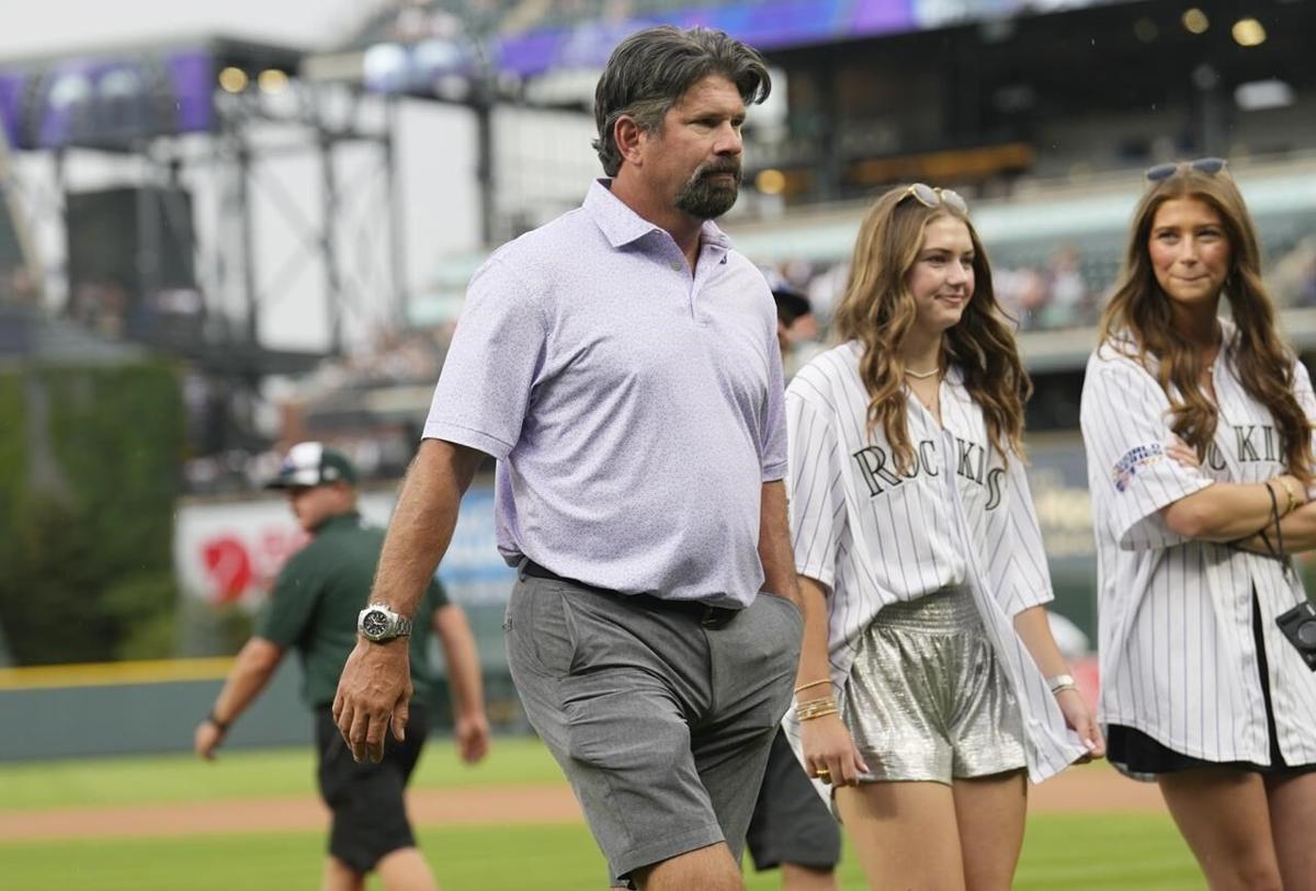 Retired Colorado Rockies first baseman Todd Helton throws out the  ceremonial first pitch before a baseball game Saturday, Aug. 19, 2023, in  Denver. (AP Photo/David Zalubowski Stock Photo - Alamy