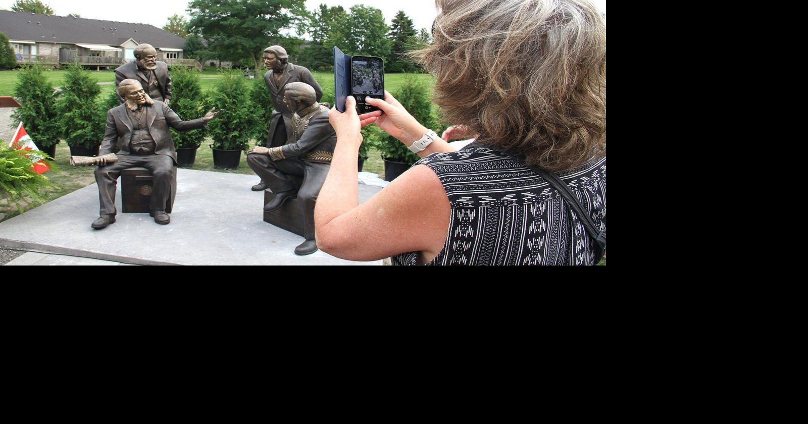 Nathan Scott’s sculpture “The Unfortunate Four” depicts the short-lived terms of four Prime Ministers, sparking historical conversations in Wilmot despite controversies.