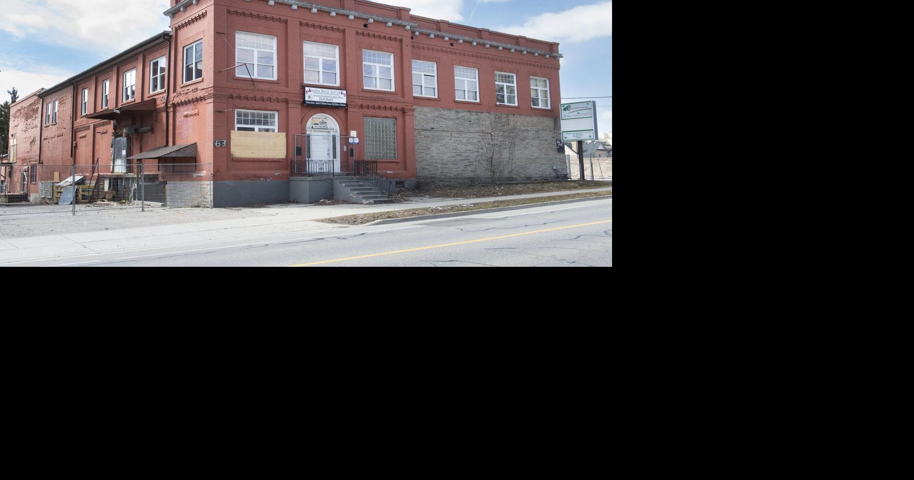A revised development plan will retain and reuse more of an historic Kitchener building that once housed J.M. Schneider’s butcher business.