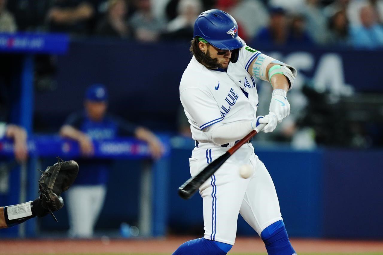 Kirk's pinch-hit double and 3 homers by Toronto power the Blue Jays past  the Rockies 13-9