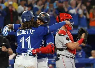 Blue Jays celebrate return to playoffs with wild clubhouse party