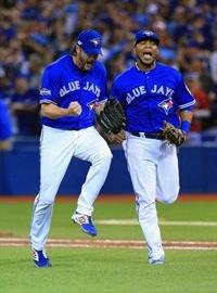 Toronto Blue Jays' Edwin Encarnacion reacts after hitting walk off