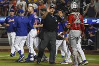 Phillies first baseman Bryce Harper leaves game versus Nationals with  mid-back spasms - ABC News