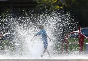 What is heat stroke and the warning signs to recognize, especially in young children