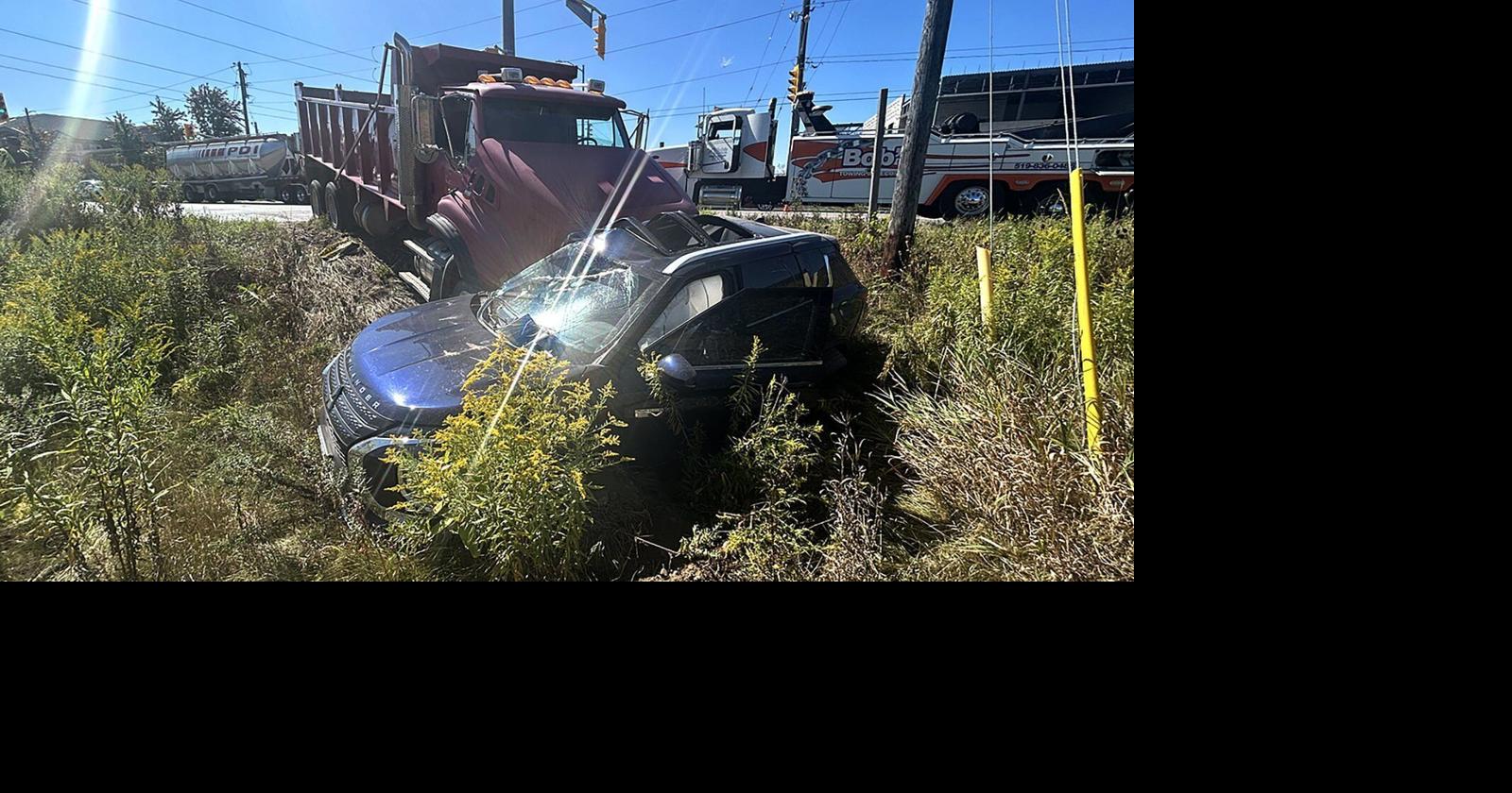 SUV driver charged after vehicle crushed by dump truck