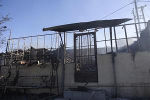 Firefighters tackle blazes on Greek islands of Chios and Kos as premier warns of 'dangerous summer'
