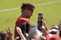 Kansas City Chiefs quarterback Patrick Mahomes signs autographs