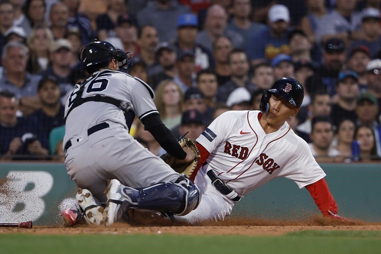 Yoshida hits grand slam as Red Sox rout Cubs for series win