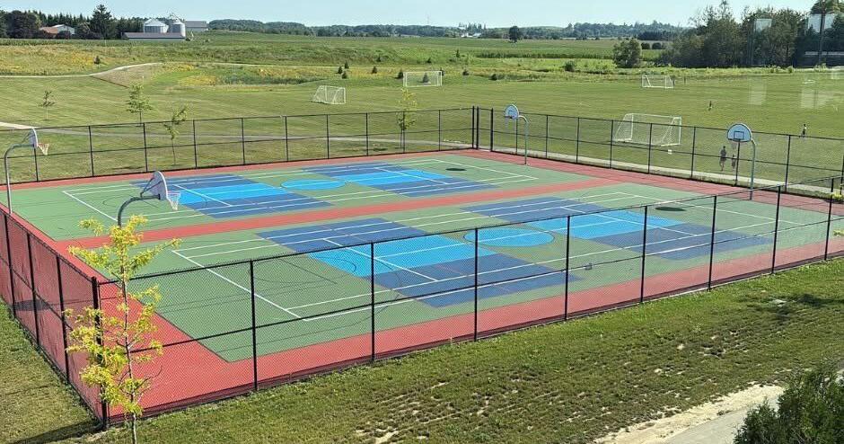 Court is designed for basketball, tennis and pickleball, with each sport having its own distinctive colours and lines.