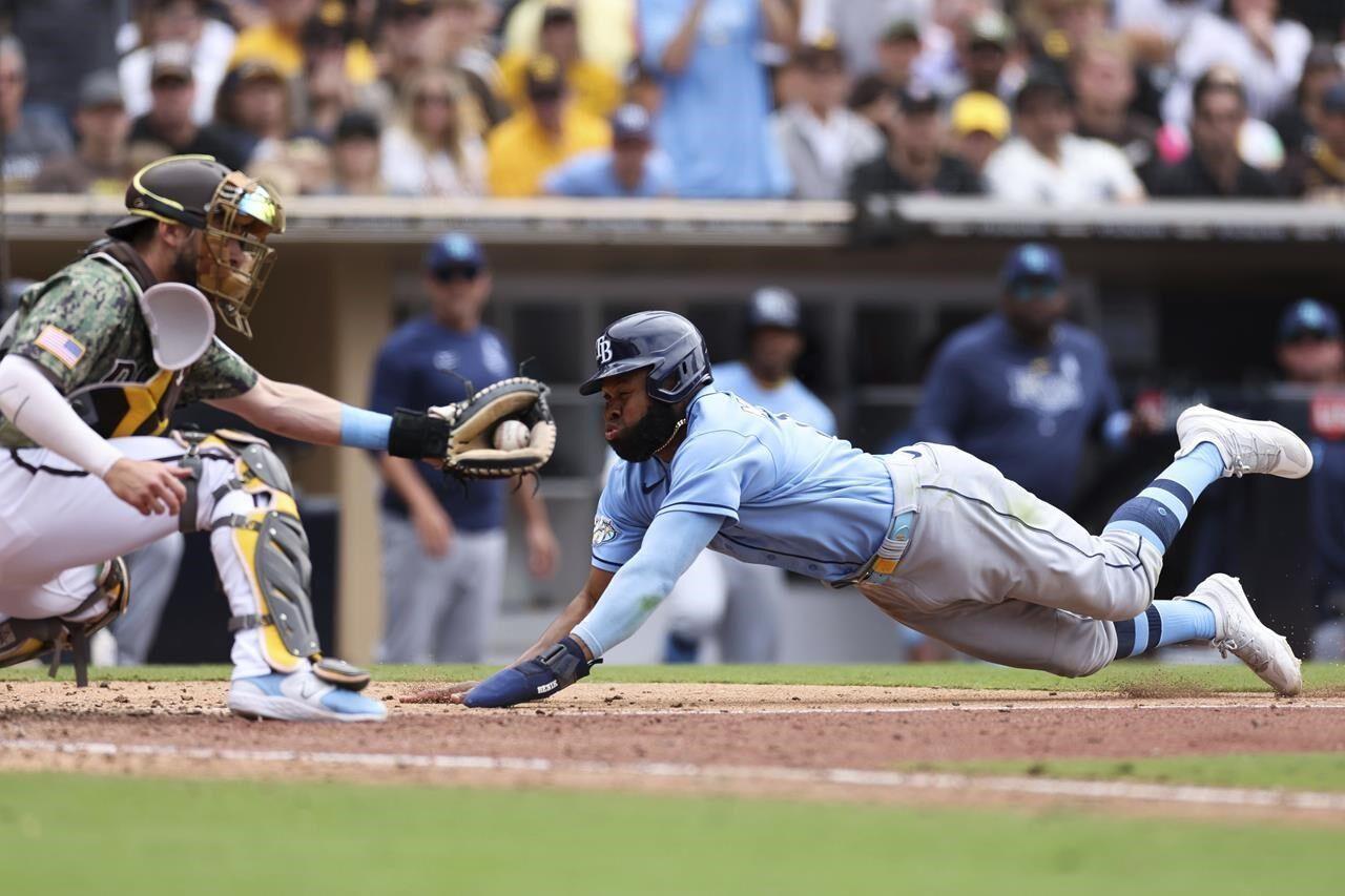 Walls tiebreaking grand slam lifts Rays over Yanks 8-7 for 4-game split