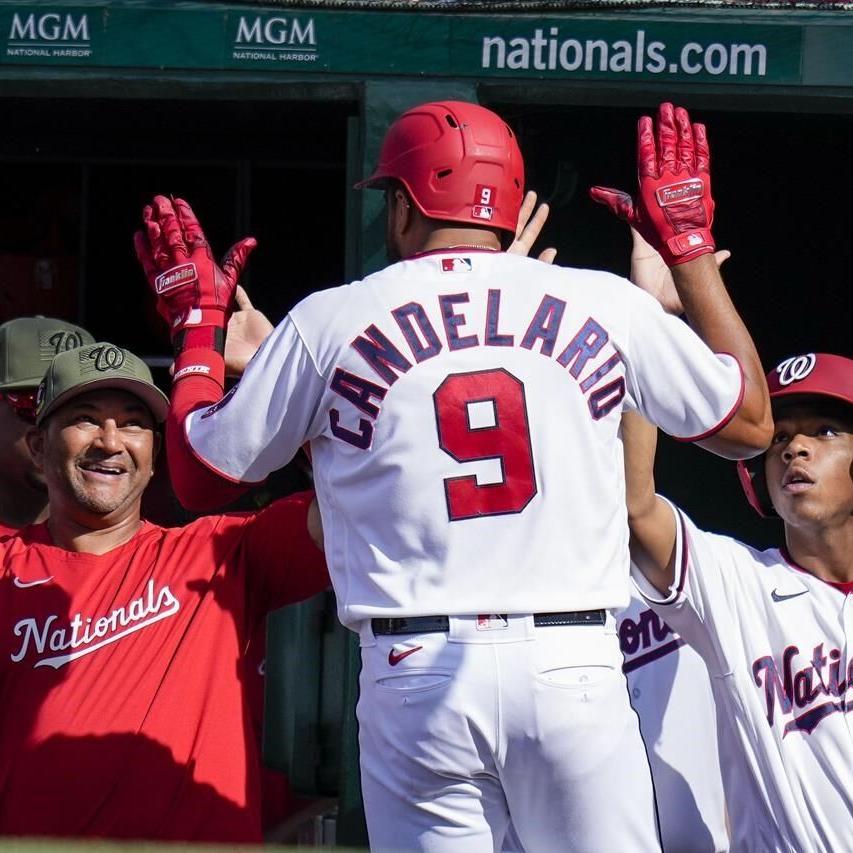 Washington Nationals shortstop CJ Abrams (5) looks to throw to first base  during a baseball game against the Detroit Tigers at Nationals Park,  Friday, May 19, 2023, in Washington. (AP Photo/Alex Brandon