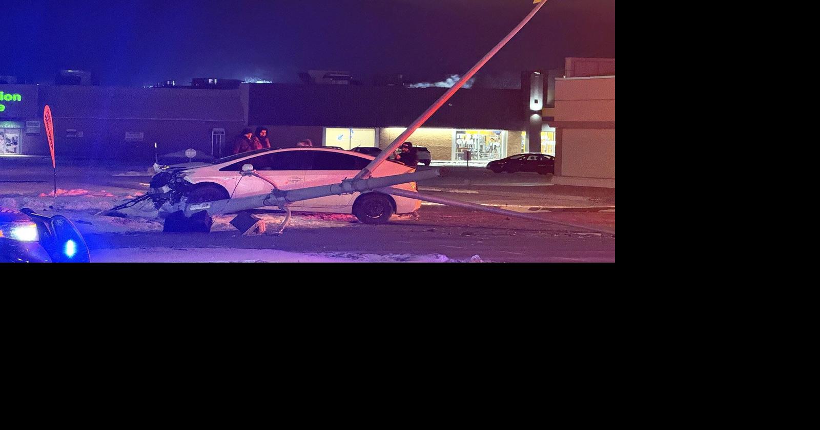 Driver injured after 2-car crash downs pole in Cambridge